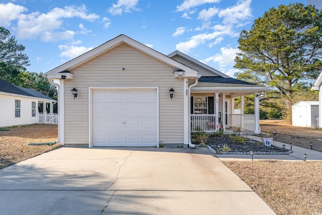 view of front facade with a garage and covered porch