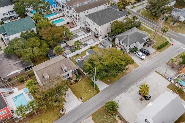 birds eye view of property with a residential view