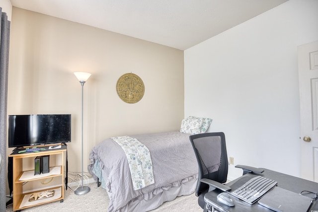 bedroom featuring carpet