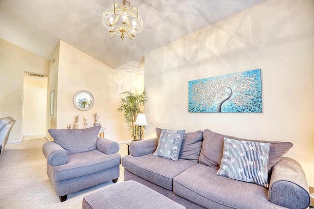 carpeted living room featuring a notable chandelier and vaulted ceiling