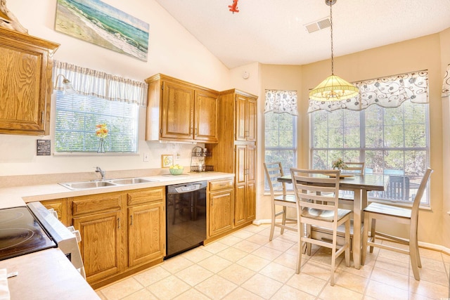 kitchen with sink, decorative light fixtures, a wealth of natural light, and black dishwasher