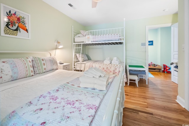 bedroom featuring light hardwood / wood-style floors and ceiling fan