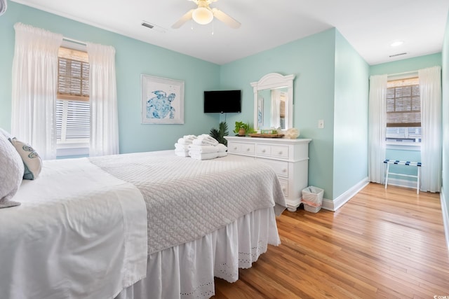 bedroom featuring ceiling fan and light wood-type flooring