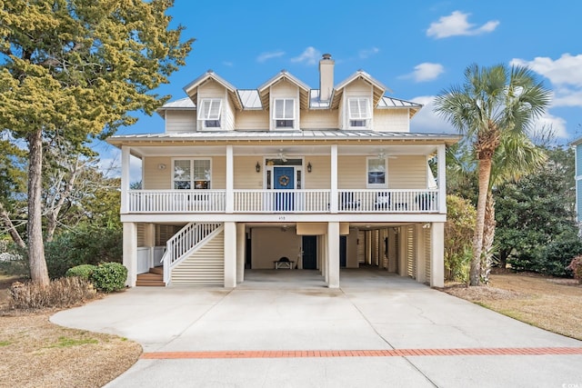 coastal home with a carport and covered porch