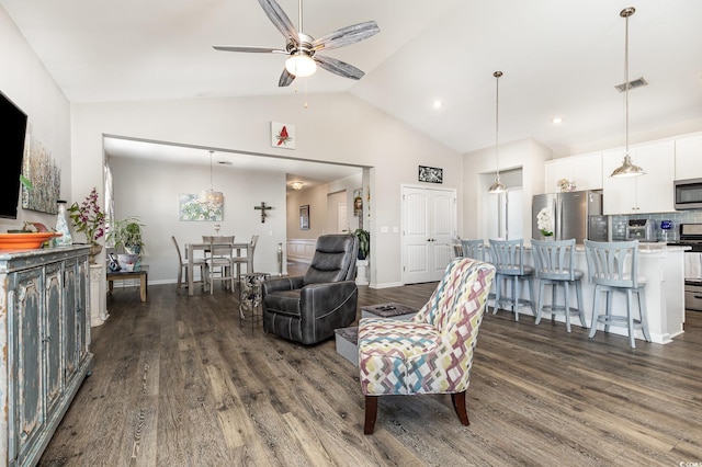 living room featuring high vaulted ceiling, dark hardwood / wood-style floors, and ceiling fan