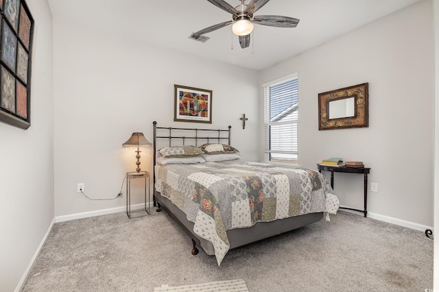 bedroom with light carpet and ceiling fan