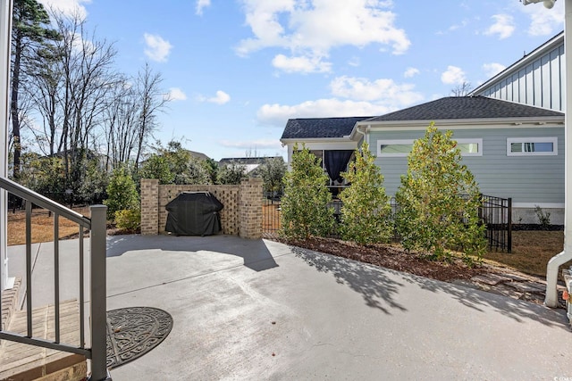 view of patio with a grill