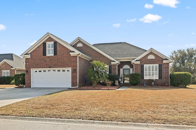 view of front property with a garage and a front lawn