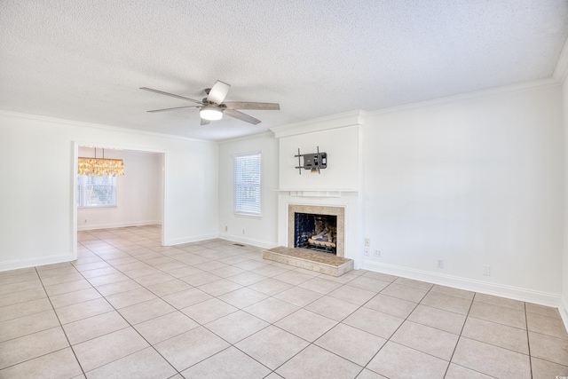 116 Great Lakes Rd, Pawleys Island, SC 29585 - unfurnished living room featuring ceiling fan, ornamental molding, a fireplace, and a wealth of natural light
