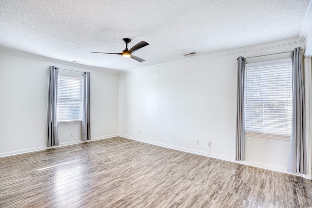 116 Great Lakes Rd, Pawleys Island, SC 29585 - spare room with hardwood / wood-style flooring, ceiling fan, ornamental molding, and a textured ceiling