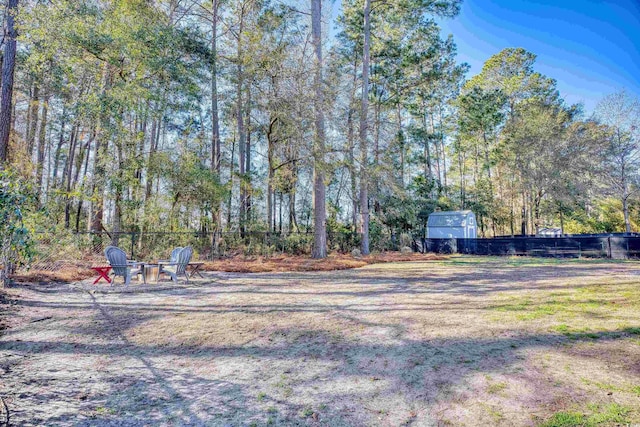 116 Great Lakes Rd, Pawleys Island, SC 29585 - view of yard featuring an outdoor fire pit