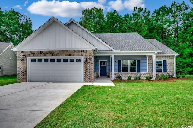 craftsman-style home featuring a garage and a front lawn