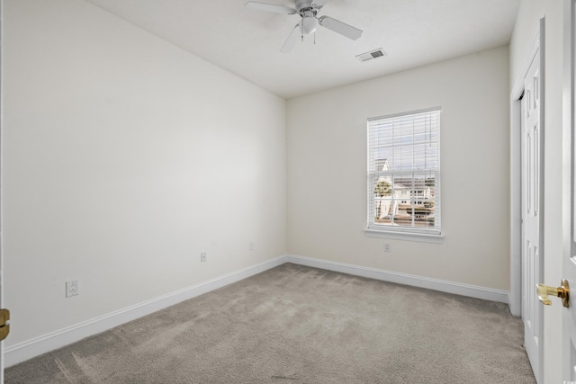 unfurnished bedroom with light carpet and ceiling fan