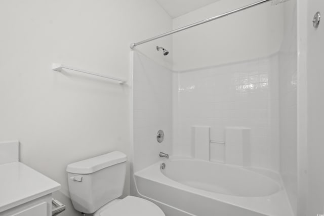 full bathroom with vanity, shower / tub combination, and toilet