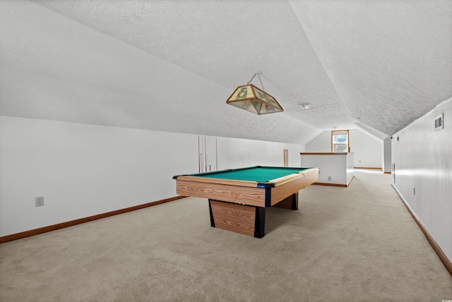 recreation room with lofted ceiling, light colored carpet, and a textured ceiling