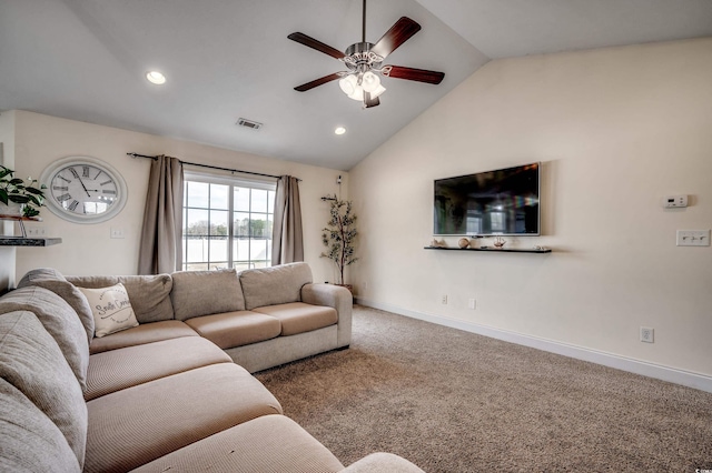 living room featuring ceiling fan, carpet flooring, and vaulted ceiling