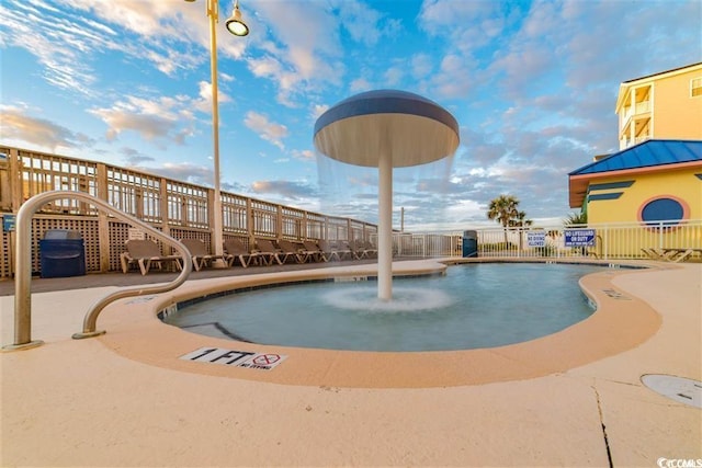 view of pool with a patio area