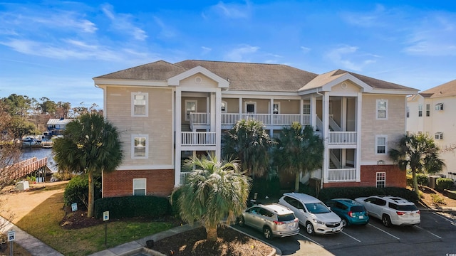 view of building exterior featuring a water view