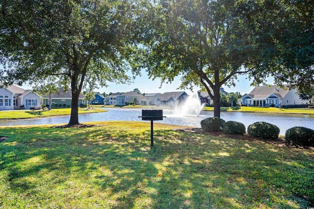 view of yard featuring a water view