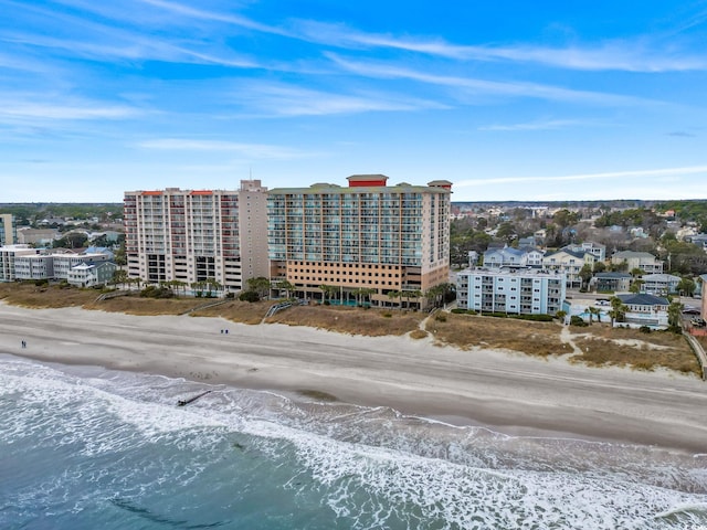 aerial view featuring a water view and a view of the beach