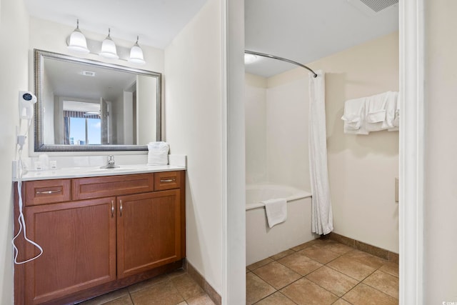 bathroom with vanity, tile patterned floors, and shower / bath combination with curtain