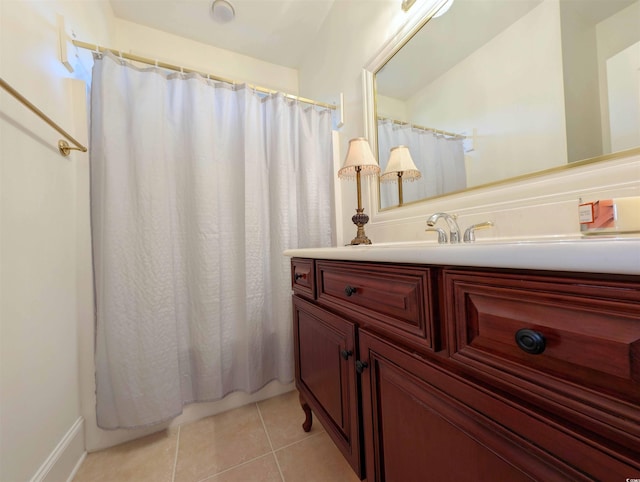 bathroom with vanity and tile patterned floors