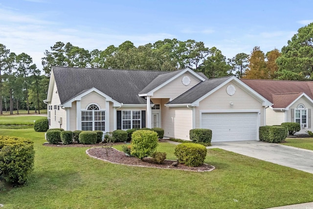 single story home featuring a garage and a front lawn