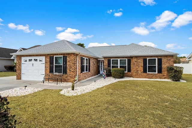 ranch-style house with a garage and a front yard