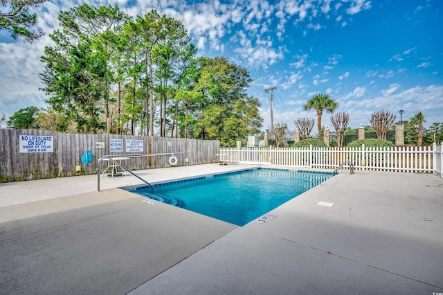 view of pool with a patio area