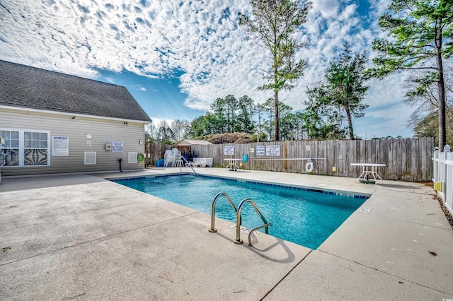 view of pool featuring a patio