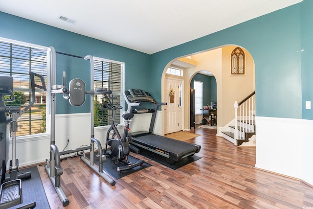 workout area featuring wood-type flooring