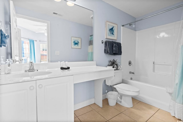 full bathroom featuring tile patterned floors, toilet, vanity, shower / bathtub combination with curtain, and ceiling fan