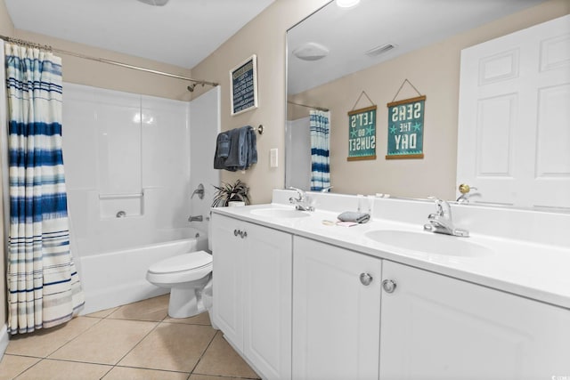 full bathroom with tile patterned flooring, vanity, toilet, and shower / tub combo with curtain