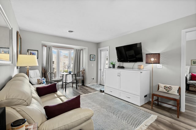 living room with light wood-type flooring