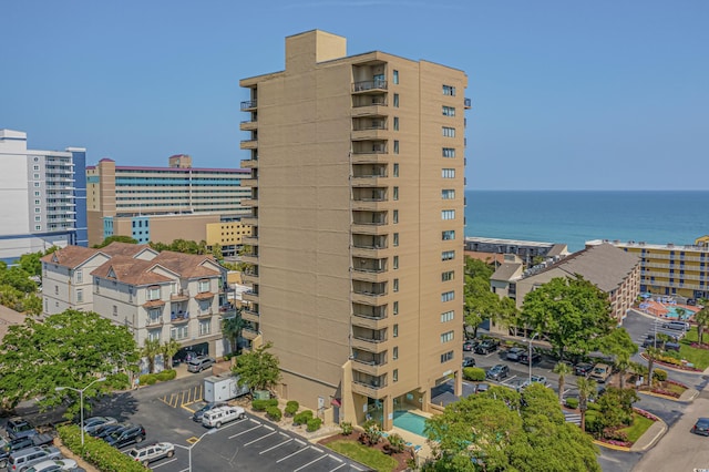 view of building exterior featuring a water view