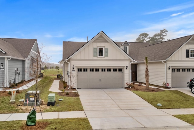 6614 Torino Ln, Myrtle Beach, SC 29572 - view of front of home with board and batten siding, concrete driveway, and a shingled roof