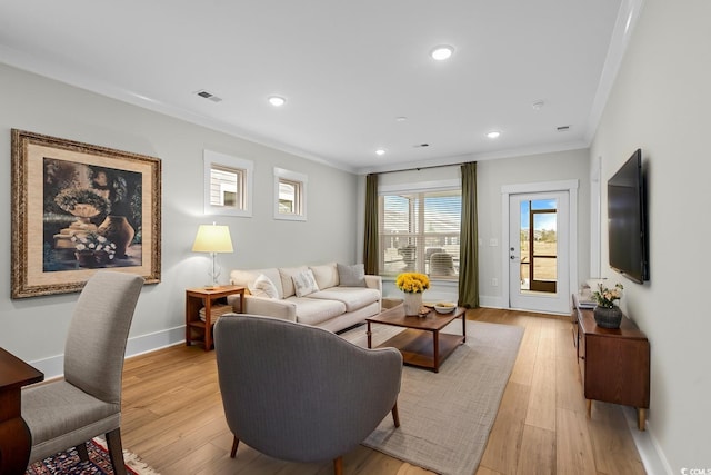 6614 Torino Ln, Myrtle Beach, SC 29572 - living room featuring crown molding, light wood-style floors, and recessed lighting