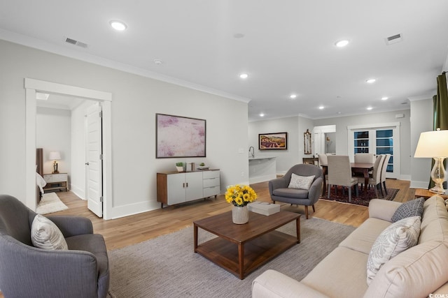 6614 Torino Ln, Myrtle Beach, SC 29572 - living room with crown molding, light wood-style flooring, and recessed lighting