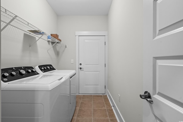 6614 Torino Ln, Myrtle Beach, SC 29572 - laundry area featuring washer and clothes dryer, baseboards, and tile patterned floors