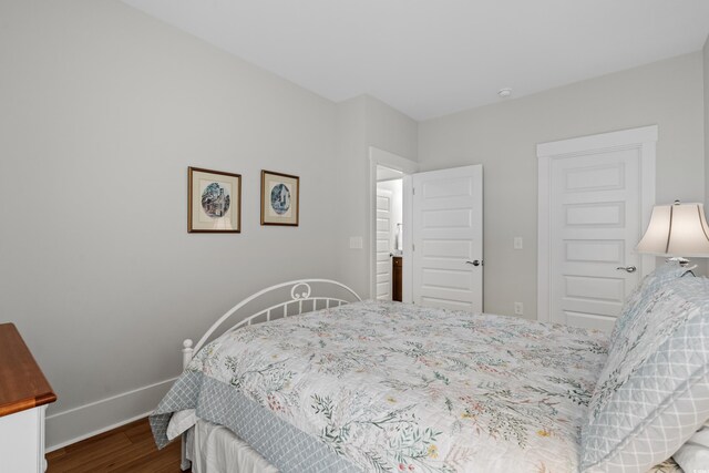 6614 Torino Ln, Myrtle Beach, SC 29572 - bedroom with dark wood-style flooring and baseboards