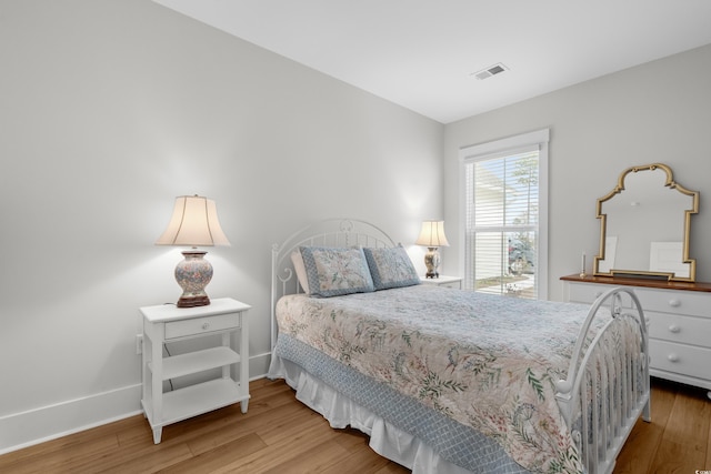 6614 Torino Ln, Myrtle Beach, SC 29572 - bedroom featuring wood finished floors and baseboards