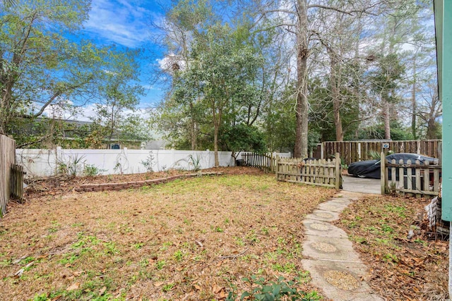 view of yard featuring a fenced backyard