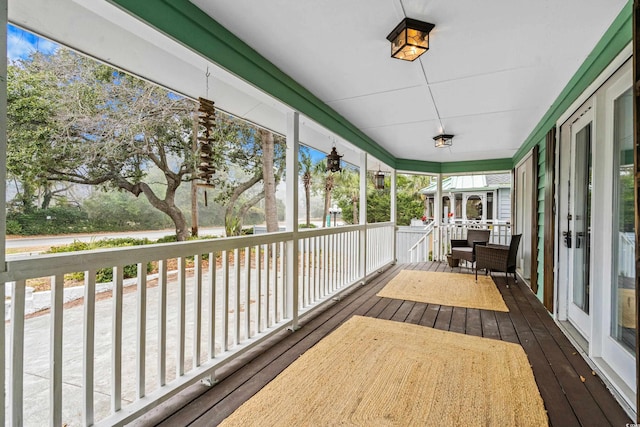 unfurnished sunroom with a healthy amount of sunlight