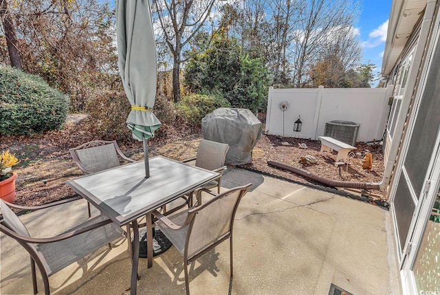 view of patio / terrace with central AC unit and grilling area