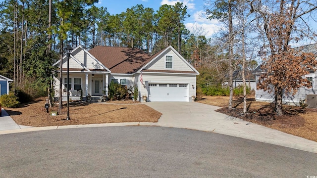 view of front of home featuring a garage and covered porch