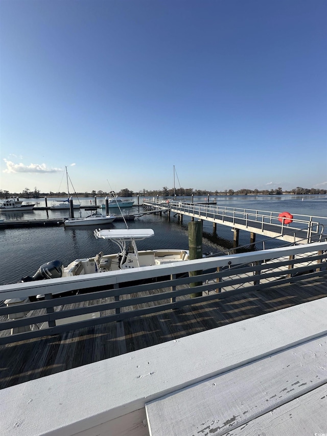 view of dock with a water view