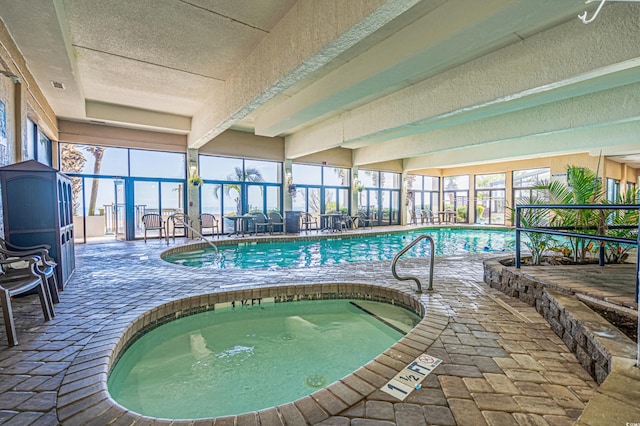 view of swimming pool featuring an indoor in ground hot tub