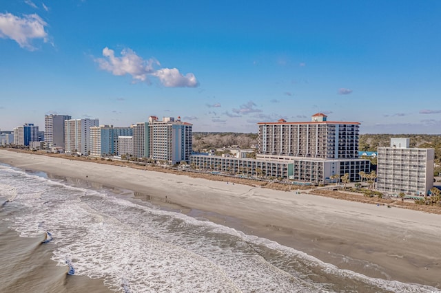 aerial view featuring a water view and a view of the beach