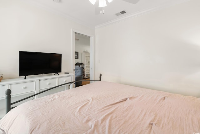 bedroom featuring crown molding and ceiling fan