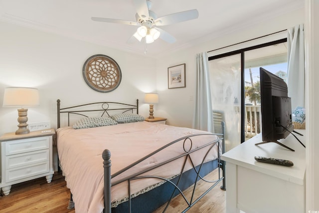 bedroom featuring ornamental molding, access to outside, ceiling fan, and light hardwood / wood-style floors